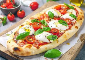 Recette Pinsa romana maison tomates, burrata et basilic : l’alternative italienne qui détrône la pizza