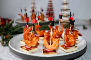 Recette Petites bouchées apéritives de scampis sur pique