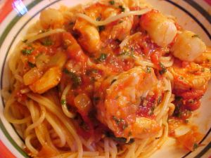 Recette Spaghetti aux fruits de mer sauce tomate aux herbes