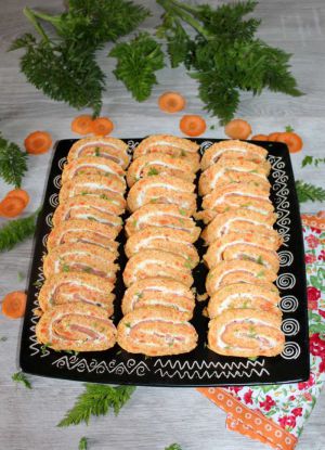 Recette Roulés aux carottes, fromage ail et fines herbes et truite