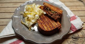 Recette Grilled cheese au pulled pork, cheddar, confit d'oignon et pain au levain