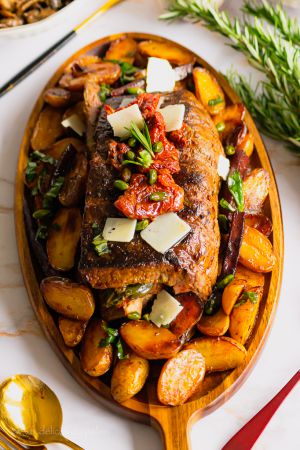 Recette Rôti de boeuf farci à l’italienne (pesto, tomates confites)