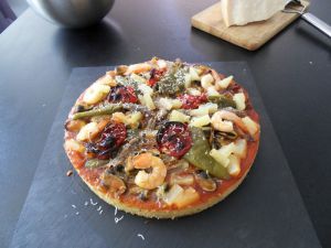 Recette Pizza aux fruits de mer a la graine de couscous