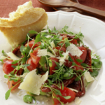 Recette Salade de cresson aux fèves, tomates et parmesan