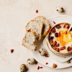 Recette Mont d’Or rôti aux fruits secs et aux œufs de caille