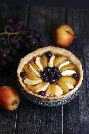 Recette Tarte pommes prunes raisins et confit d’agrumes