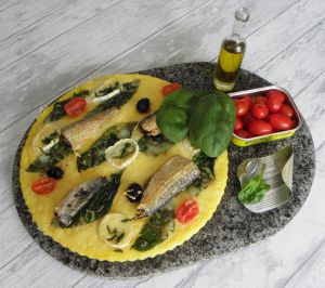 Recette Pizza de polenta aux épinards, chèvre & sardines