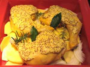 Recette Cuisses de poulet jaune à la moutarde sur son lit de pommes de terre