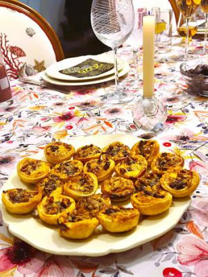 Recette Mini-tartelettes au confit d’oignon, magret et noix