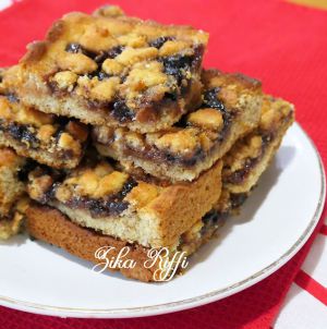 Recette Tarte rustique à la confiture de raisins roues à l'eau de rose- Pâte à la cannelle