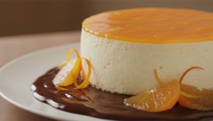 Recette Délice léger : Cheesecake à l’orange sur un lit de chocolat fondant