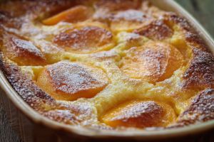 Recette Clafoutis aux pêches en boîte : mon astuce pour le rendre inoubliable